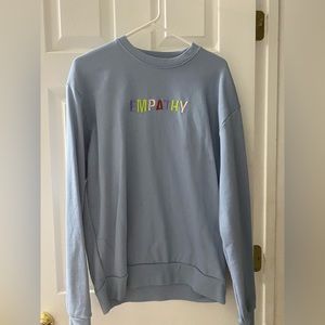 light blue crew neck